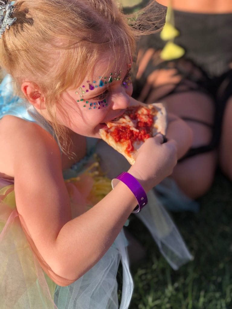 daughter eating pizza