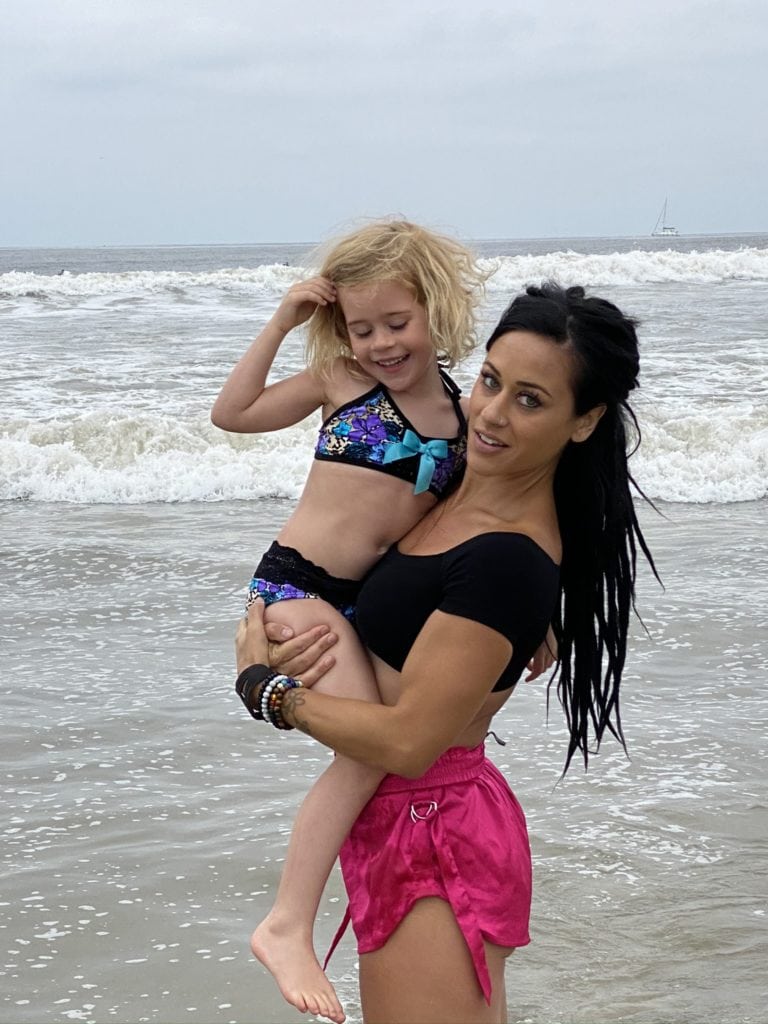 wife and daughter at the beach