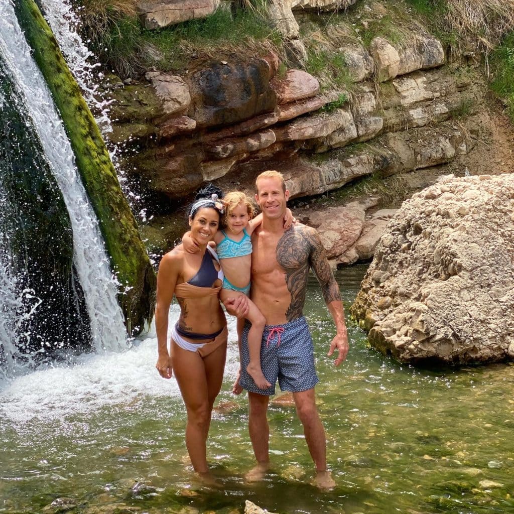 family in the waterfall
